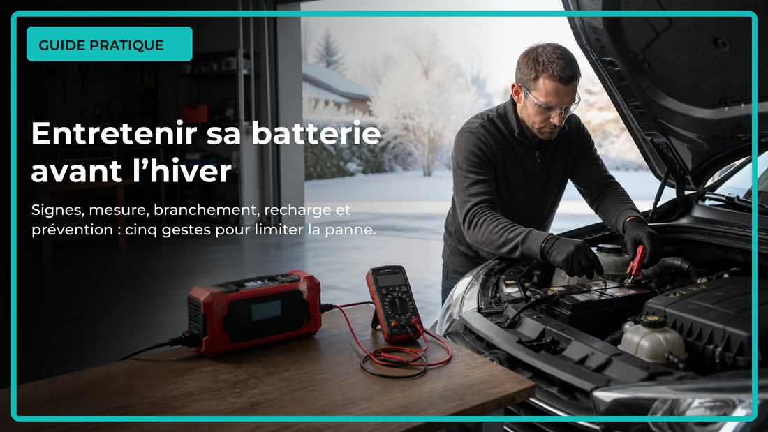 Contrôle et recharge d’une batterie de voiture avant l’hiver dans un garage lumineux